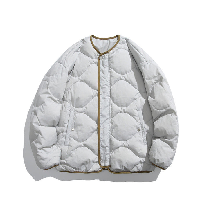 Unisex Kastig padded short jacket with circular quilting, round neckline and contrast piping Mune Fashion
