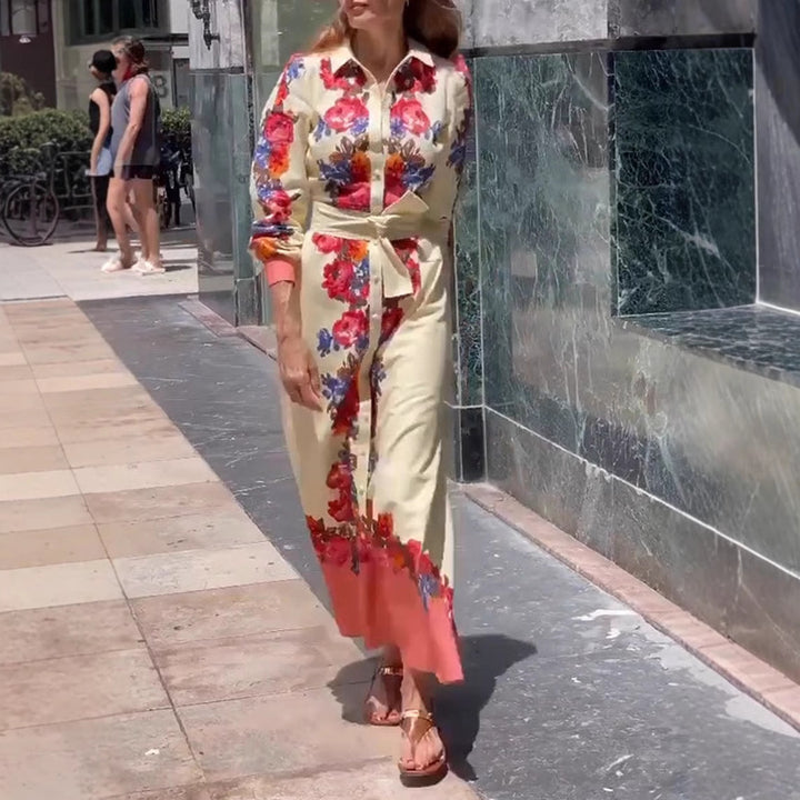 Women's long hem blouse dress with floral print, tie belt, and ruffle trim Mune Fashion