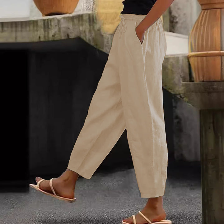 Women's loose-fitting linen blend pants with elastic waistband, drawstring, and angled side pockets Mune Fashion