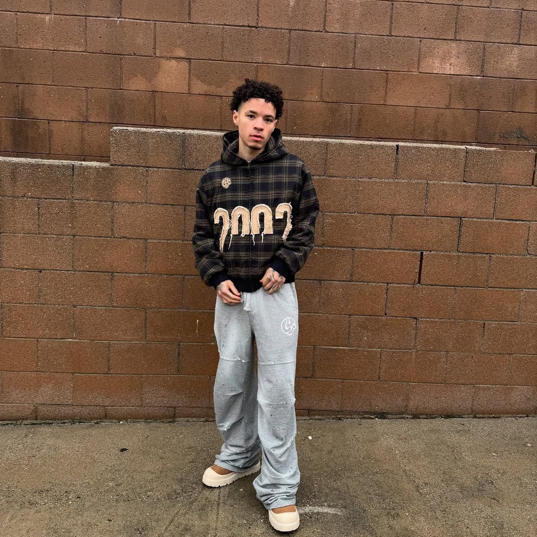 Unisex nan checkered hoodie with frayed year application and ribbed cuffs Mune Fashion