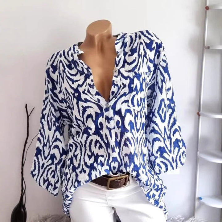 Women nan locker cut tunic blouse with Ikat pattern, V-neck and three-quarter sleeves Mune Fashion