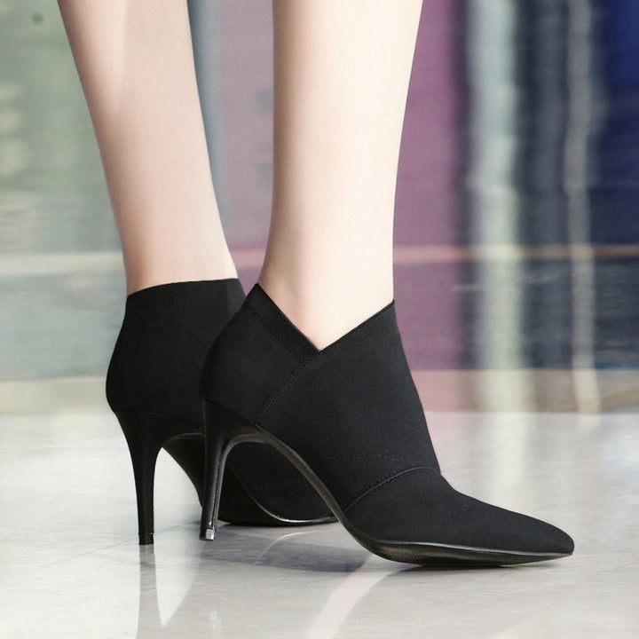 Ladies lace ankle boots with canvas upper and mid-high stiletto heel Mune Fashion