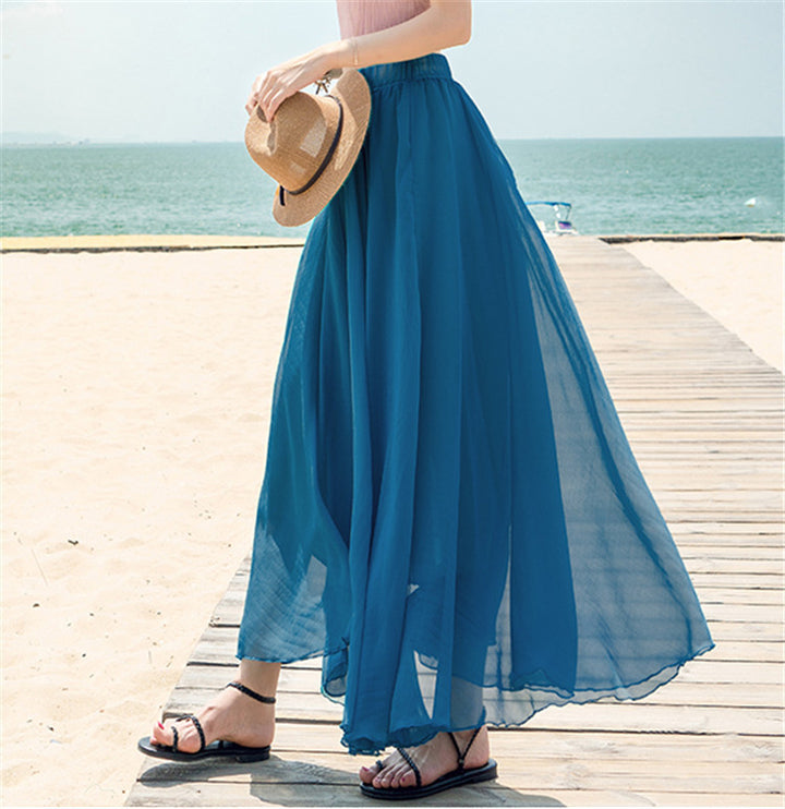 Women's flowing maxi skirt made of chiffon with elastic waistband and layered ruffle Mune Fashion