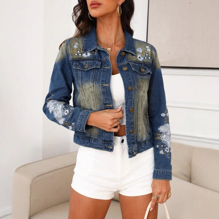 Women’s Embroidered Cropped Denim Jacket in Trucker Style with Floral Sleeve Detailing Mune Fashion