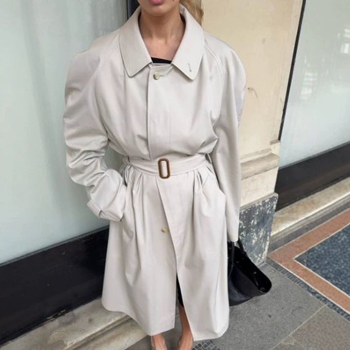 Women's mid-length trench coat in cocoon cut with belt and raglan sleeves Mune Fashion