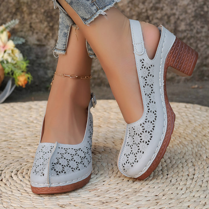 Women's elegant slingback pumps with floral laser cut, padded comfort insole and stable block heel Mune Fashion