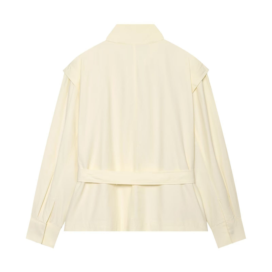 Women's short jacket made of flowing fabric with waist belt and cape shoulder drape