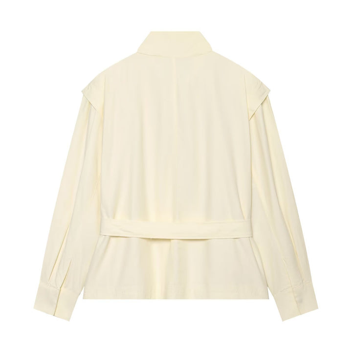 Women's short jacket made of flowing fabric with waist belt and cape shoulder drape