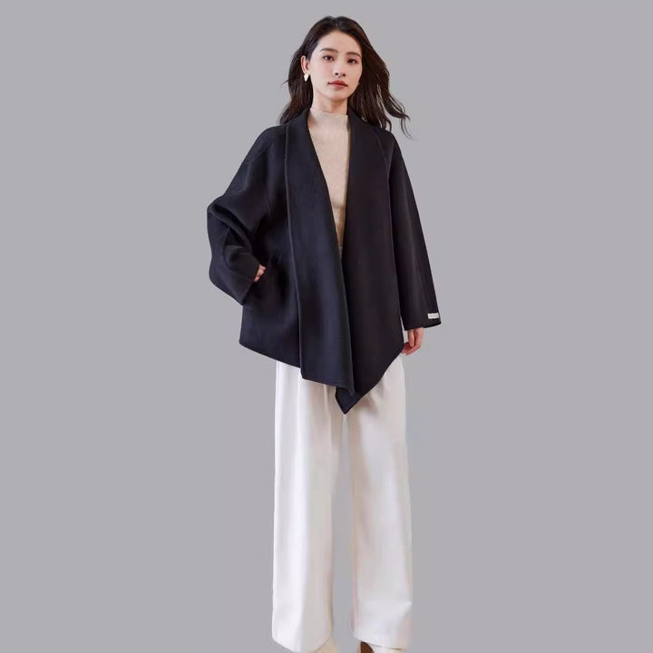 Women's oversized coat made from wool blend with open shawl collar and asymmetrical hem Mune Fashion