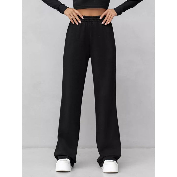 Women's flowing palazzo lounge pants with extra wide leg, elastic comfort waistband, and discreet side pockets Mune Fashion