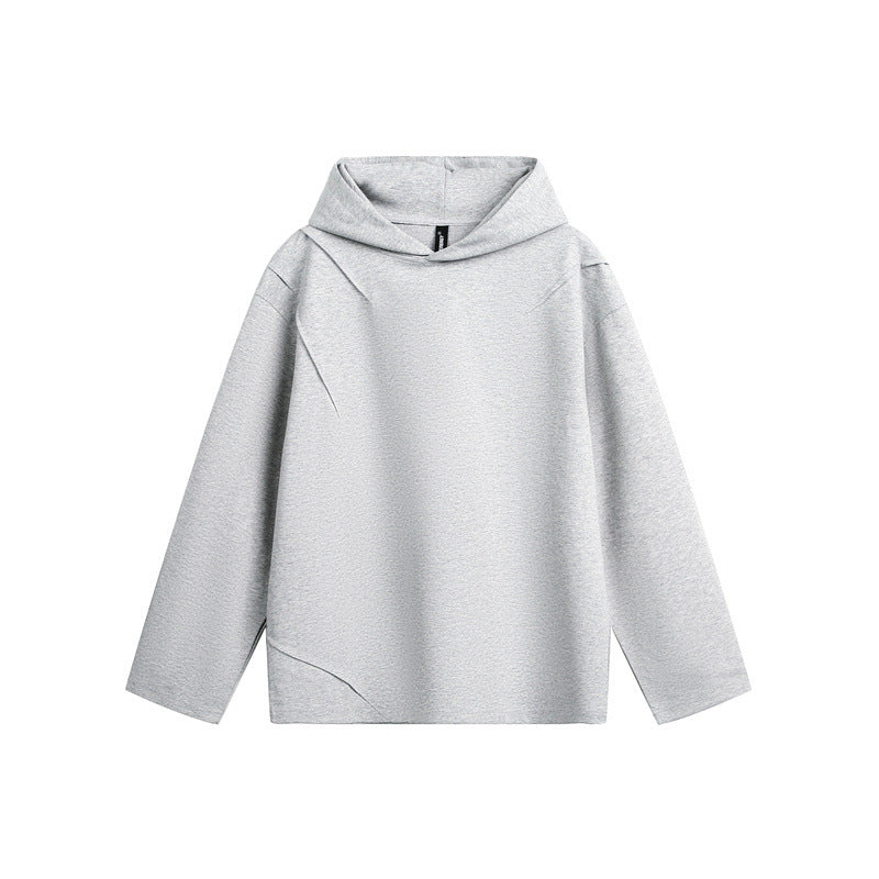 Unisex Oversize Hoodie made of lightweight French Terry with distinctive darts.