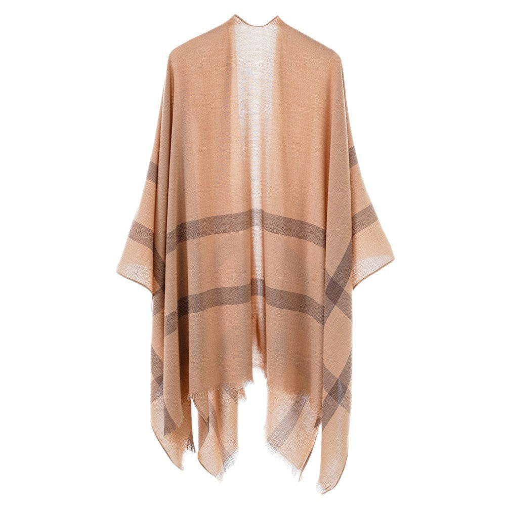 Women’s lightweight fine knit cape with diagonal contrasting stripes and fringes Mune Fashion