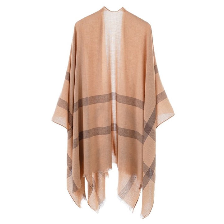 Women’s lightweight fine knit cape with diagonal contrasting stripes and fringes Mune Fashion