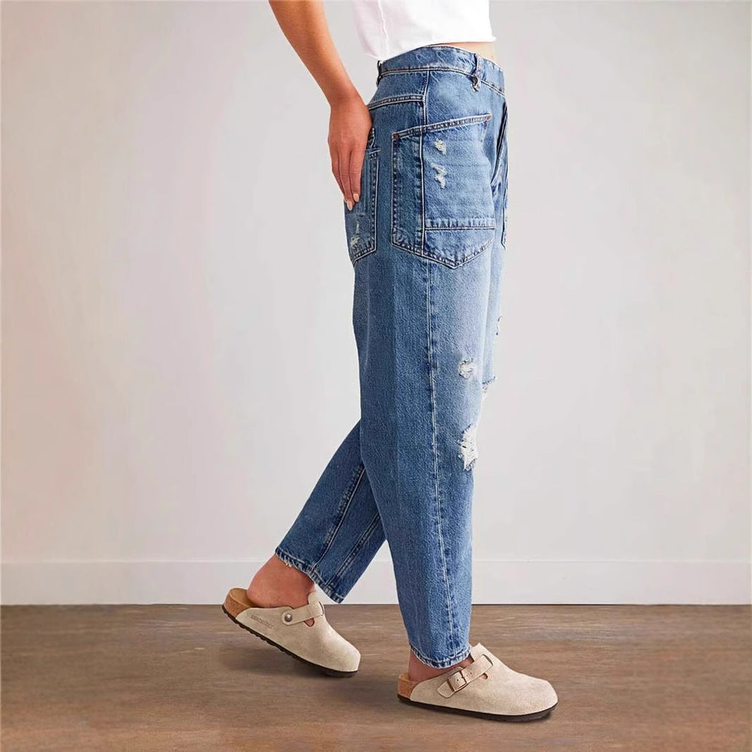 Women's oversized straight-leg jeans with patch cargo pockets and used effects Mune Fashion