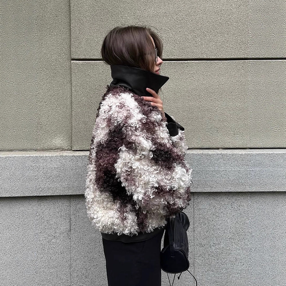 Women's short jacket made of curly bouclé faux fur with leather look detailing Mune Fashion