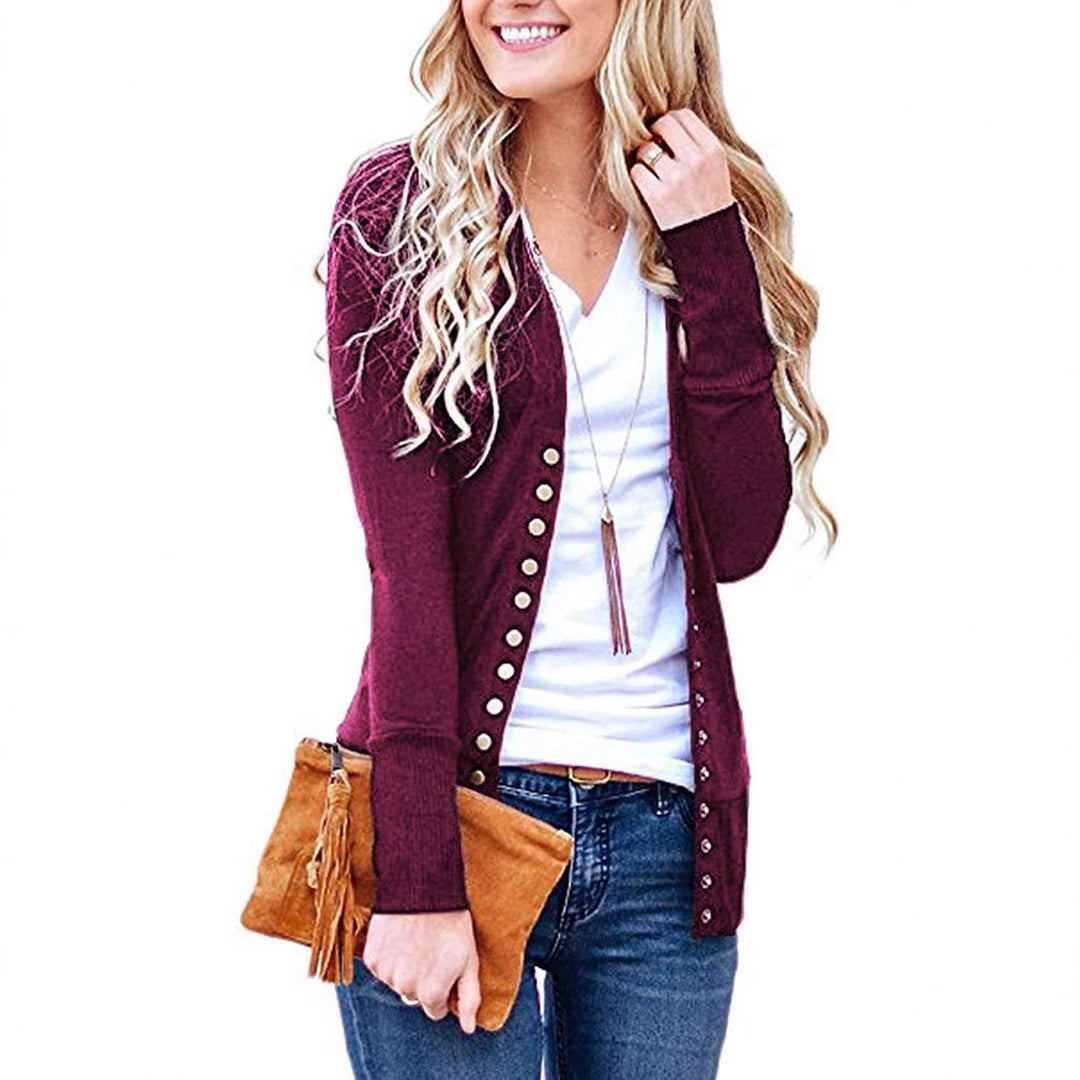 Women's fine knit cardigan with decorative metallic buttons and slim silhouette Mune Fashion