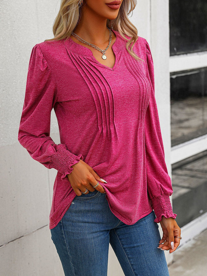 Women's long sleeve shirt with V-neckline, decorative inverted pleats at the front and elastic smocked cuffs Mune Fashion