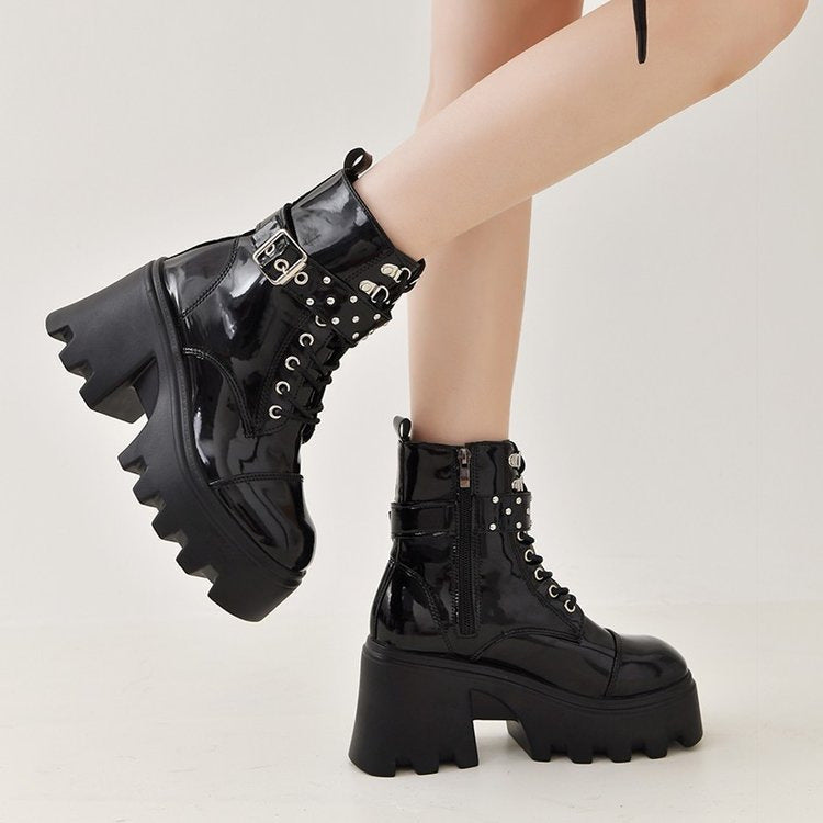 Ladies high-cut platform biker ankle boots in patent look with lacing, side zipper, and decorative buckle and stud application Mune Fashion