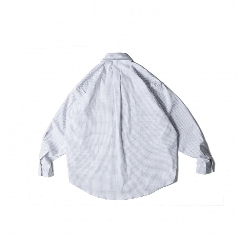 Unisex Oversize-checkered Shirt with rounded hem and appliquéd chest pockets Mune Fashion