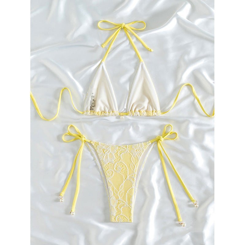 Ladies triangle bikini with fine lace pattern and playful bow detail Mune Fashion