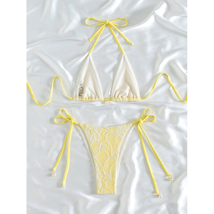 Ladies triangle bikini with fine lace pattern and playful bow detail Mune Fashion