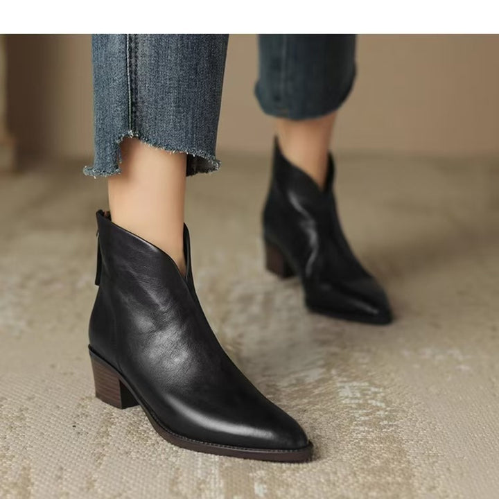 Women's pointed Chelsea-inspired ankle boot with asymmetric shaft and mid-high block heel Mune Fashion