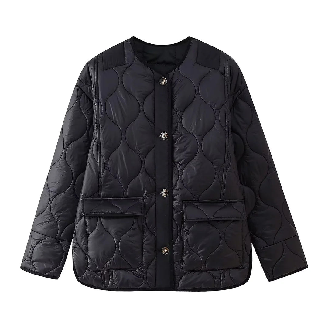 Women's light quilted transitional jacket with organic wave quilting, round neck, dropped shoulders, and flap pockets Mune Fashion