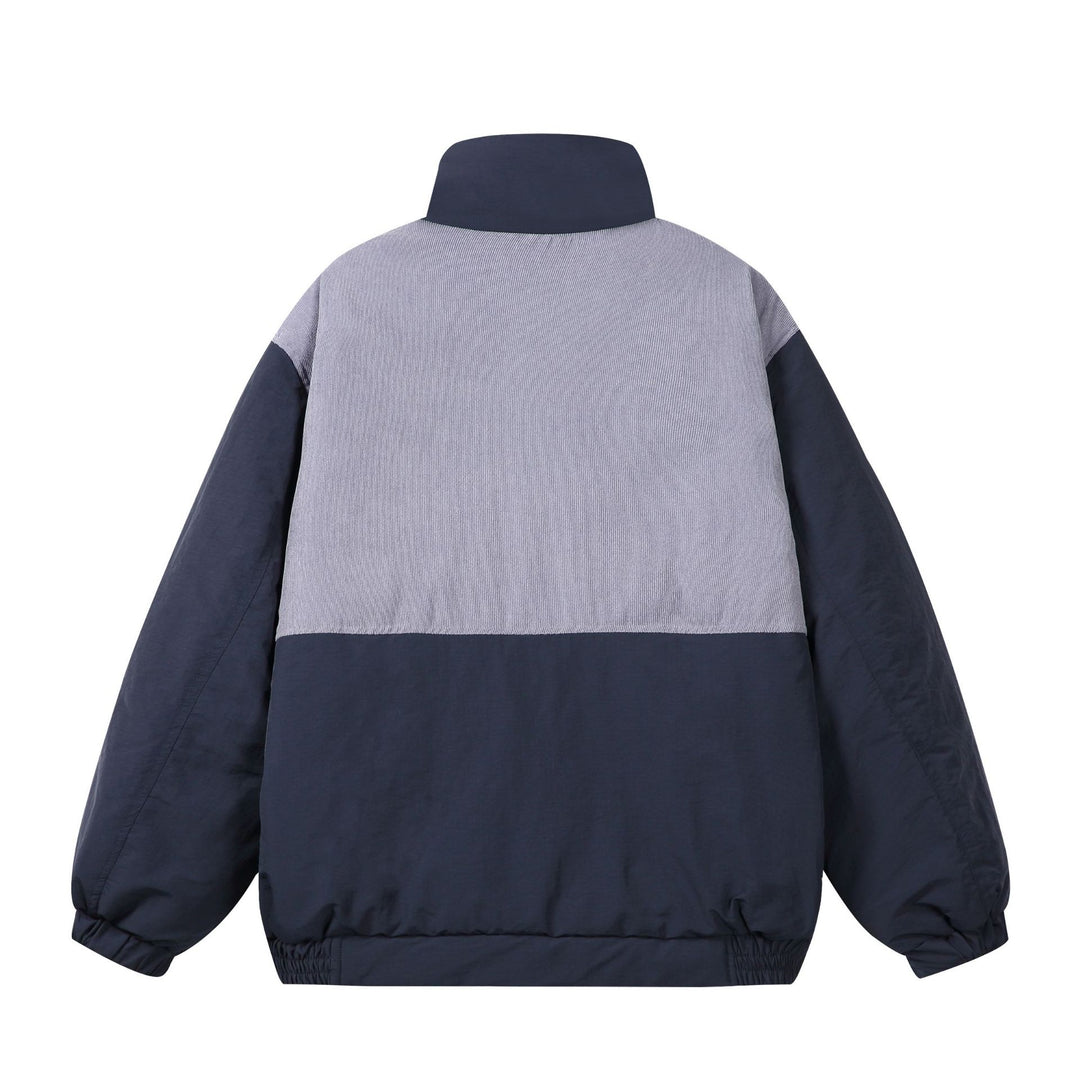 Unisex Boxy Puffer Jacket with high stand-up collar, cord shoulder yoke and large flap pockets Mune Fashion