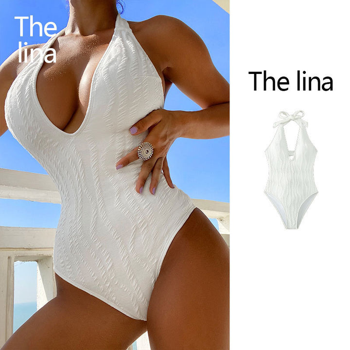 Women one-piece swimsuit with deep V-neckline and elaborate ruffle details Mune Fashion
