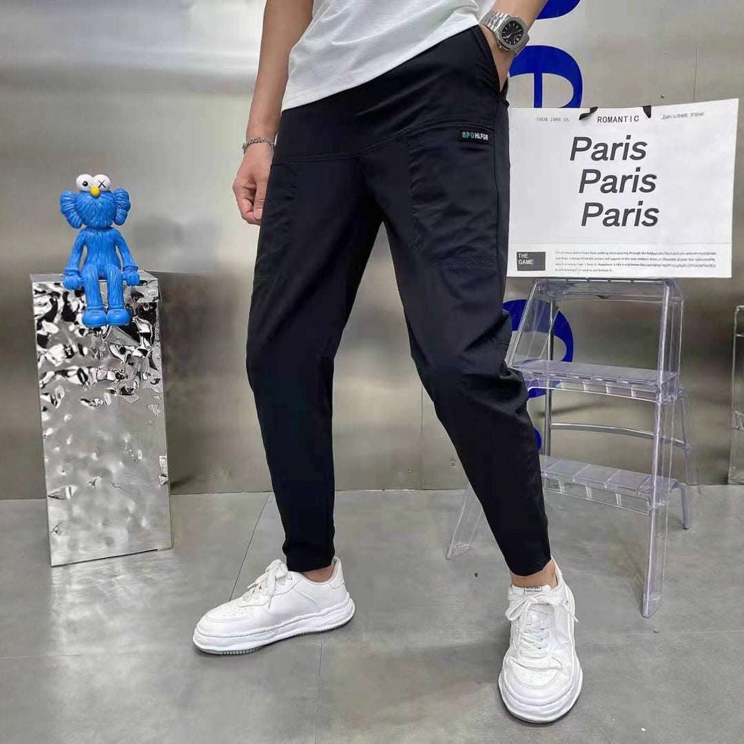 Men's sporty cargo jogger pants with elastic waistband, drawstring, and tapered leg hem Mune Fashion