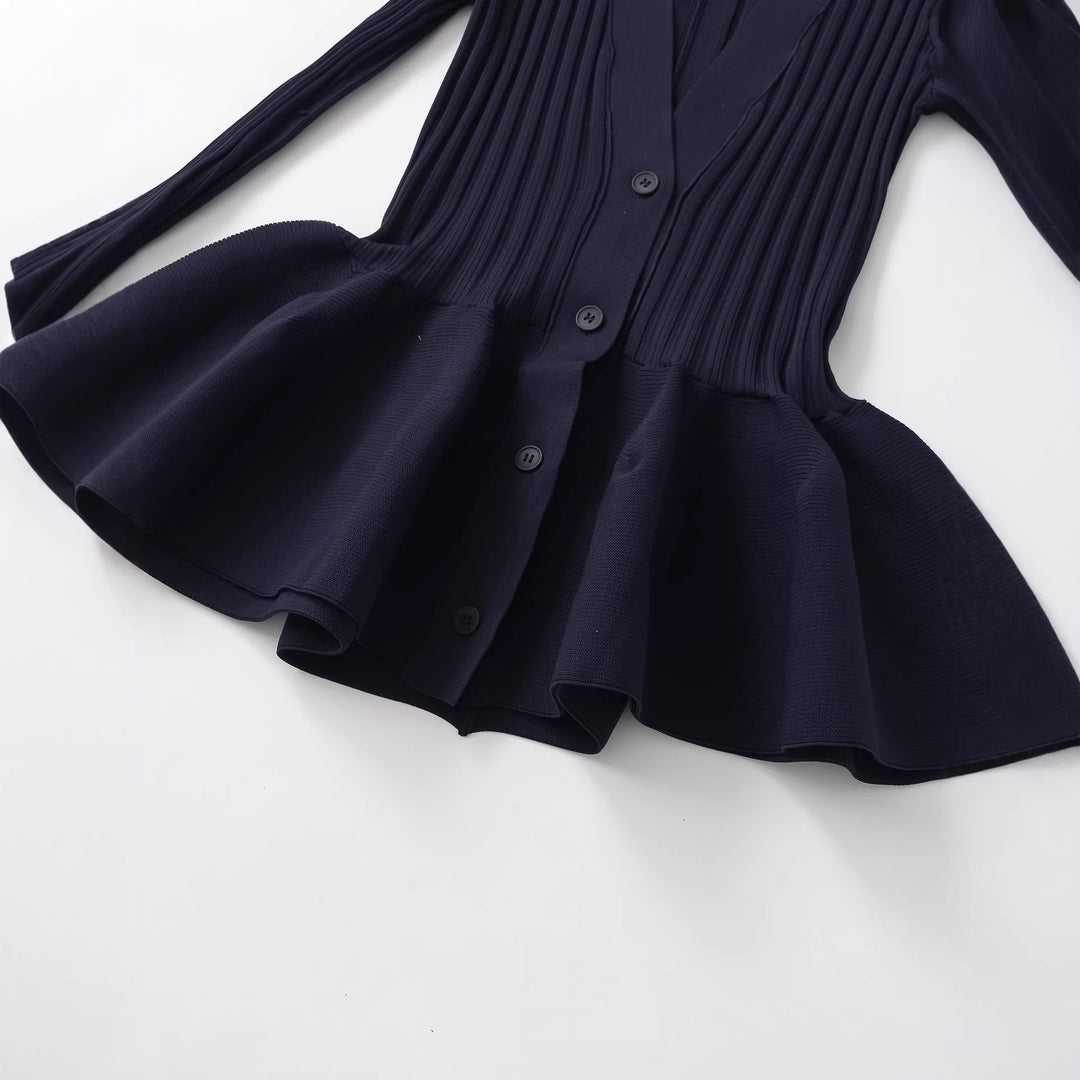 Women's ribbed knit cardigan with shawl collar, fitted flounce hem and button placket Mune Fashion