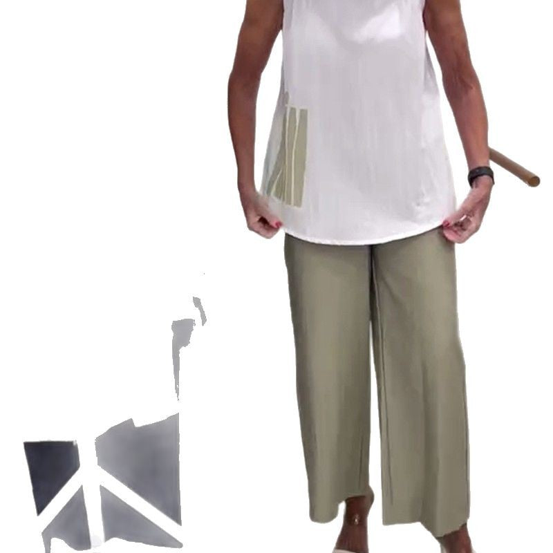 Women's sleeveless blouse top with wide shawl collar, relaxed A-line and side decorative yoke Mune Fashion