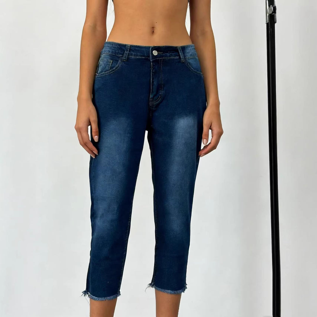 Women's narrow ankle-length jeans with raw fringe finish and mid-rise waist Mune Fashion
