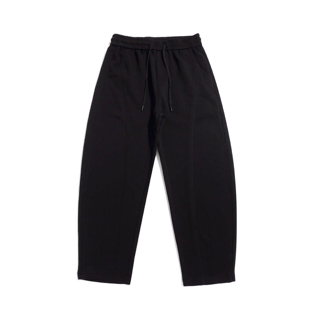 Women's cropped jogger pants with decorative seams, high elastic waistband and side pockets