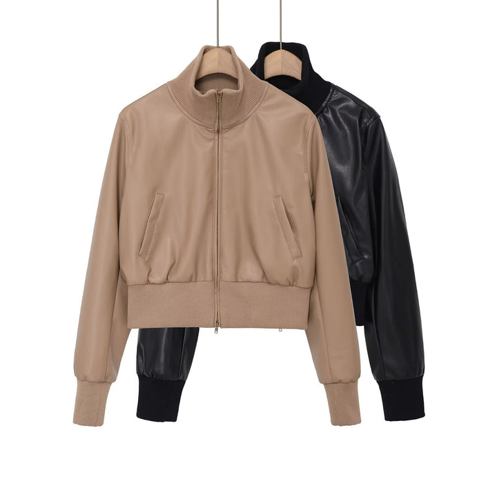 Women's short jacket in leather look with high structured collar and fitted ribbed waistband Mune Fashion