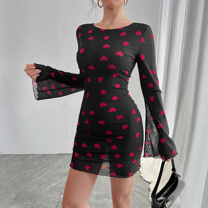 Women's figure-hugging mini dress made of fine mesh fabric with heart pattern and trumpet sleeves Mune Fashion