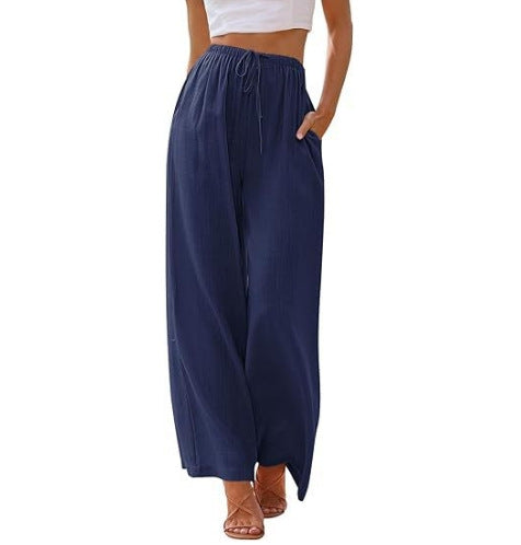 Women's wide linen pants with elastic waistband, drawstring, and side pockets Mune Fashion