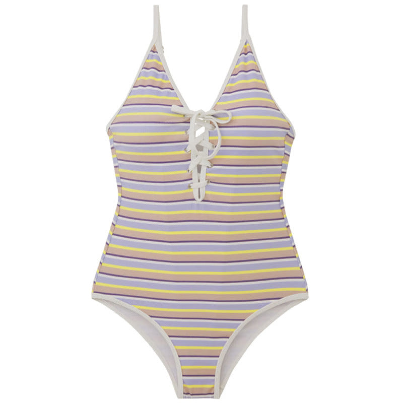Ladies one-piece swimsuit with fashionable lacing detail and elegant striped design Mune Fashion