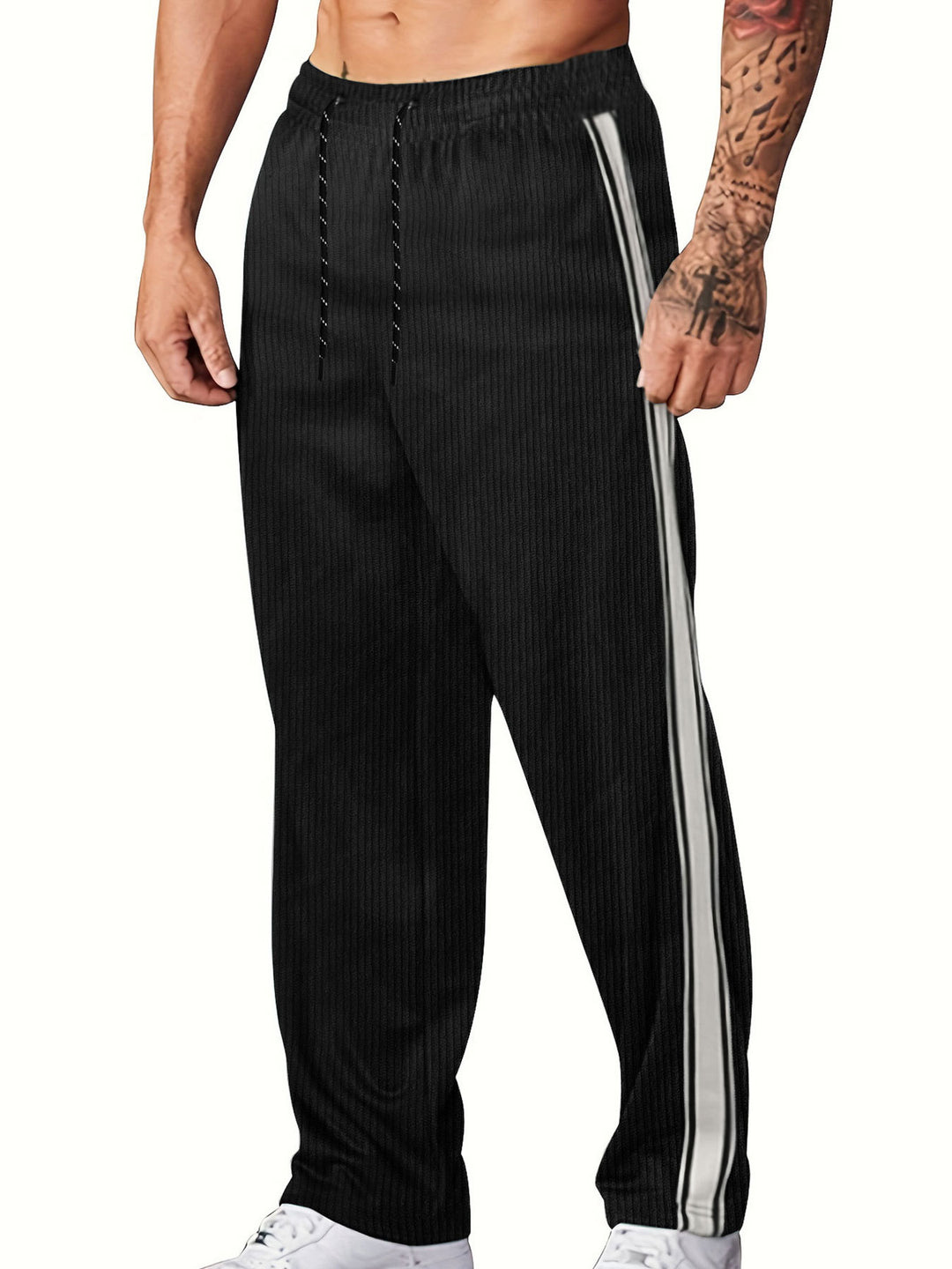 Men's knitted relaxed joggers with wide leg, side piping, and elastic drawstring waistband Mune Fashion
