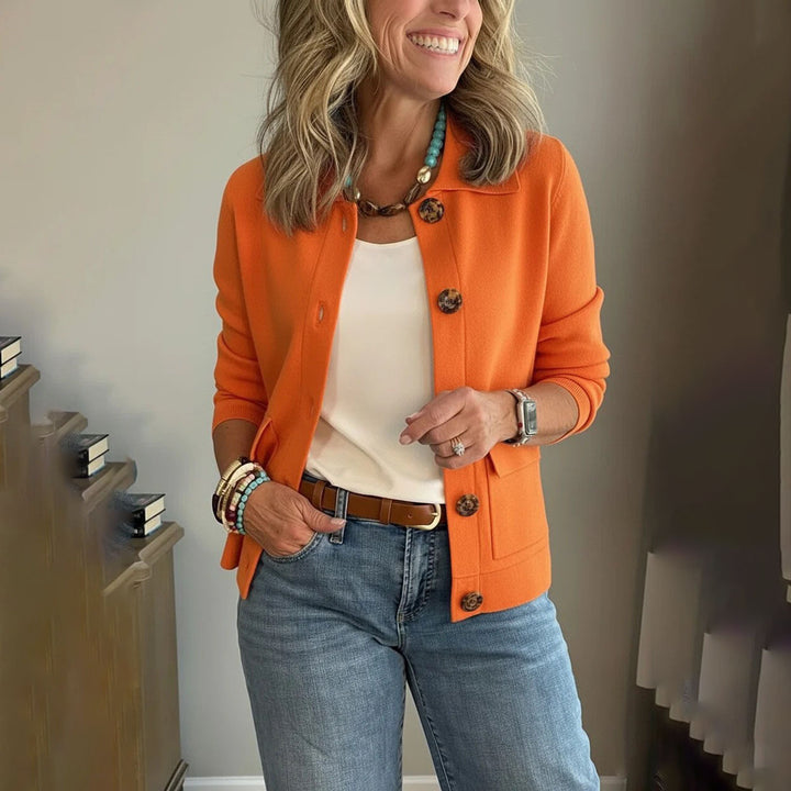 Women's short knitted cardigan with shirt collar, patch pockets, and horn buttons Mune Fashion