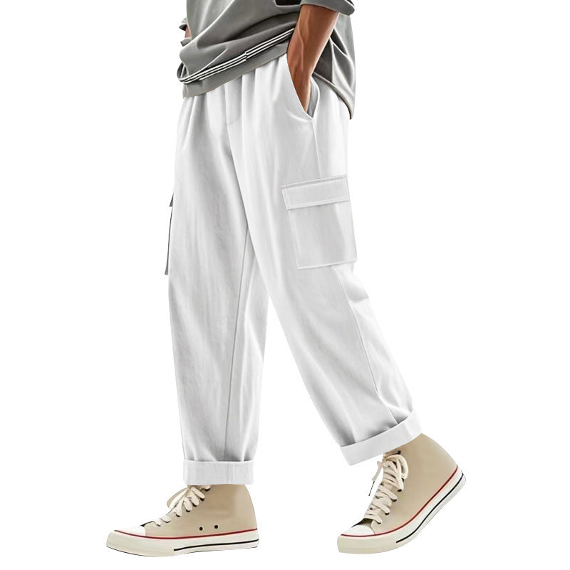 Men's wide cargo pants with flap pockets, elastic comfort waistband, and turned-up hem Mune Fashion
