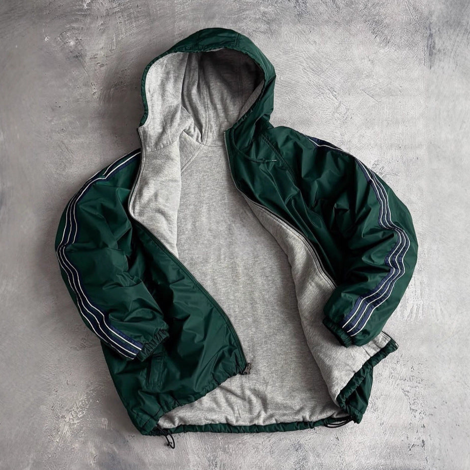 Unisex non-fitted windbreaker with hood padded fleece lining drawstring hem and decorative stripes on sleeves Mune Fashion