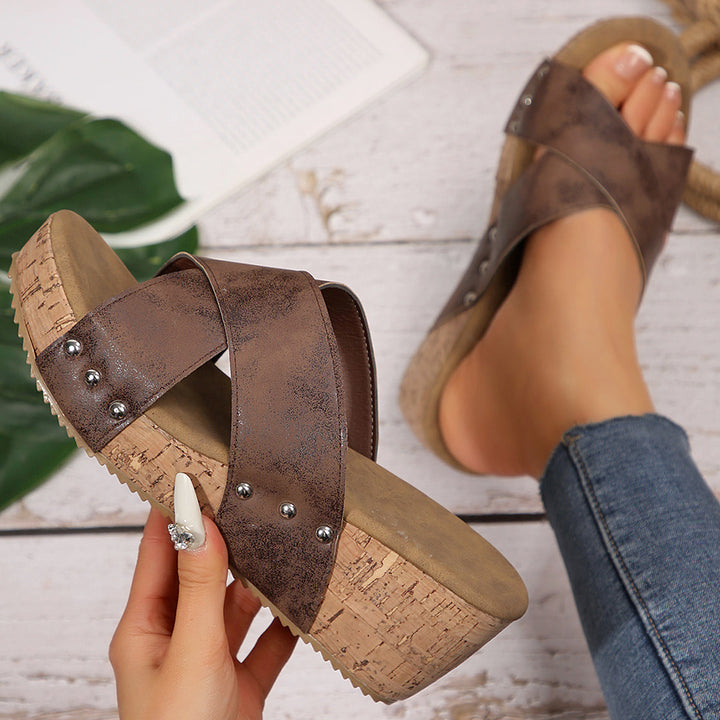 Women’s wedge sandals with heel strap, ergonomic footbed, cork look platform, and padded toe area Mune Fashion