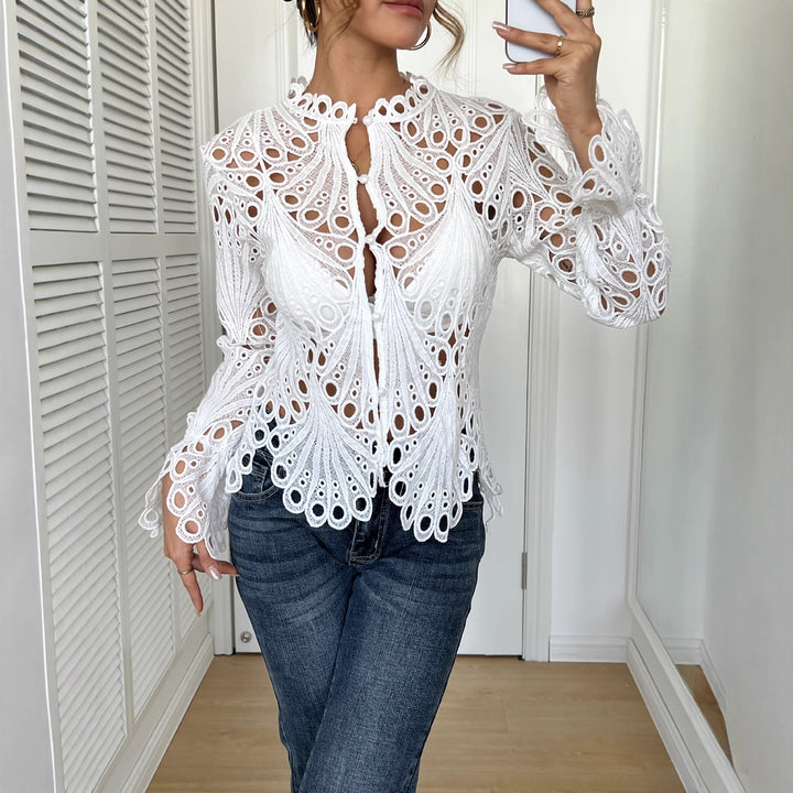 Women's filigree crochet lace blouse with stand-up collar, decorative button placket, and wavy hem Mune Fashion