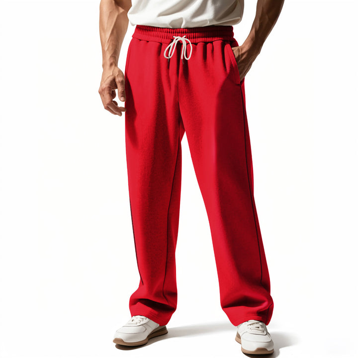 Men's casually fitting sweatpants with side decorative seam, elastic comfort waistband, and deep side pockets Mune Fashion