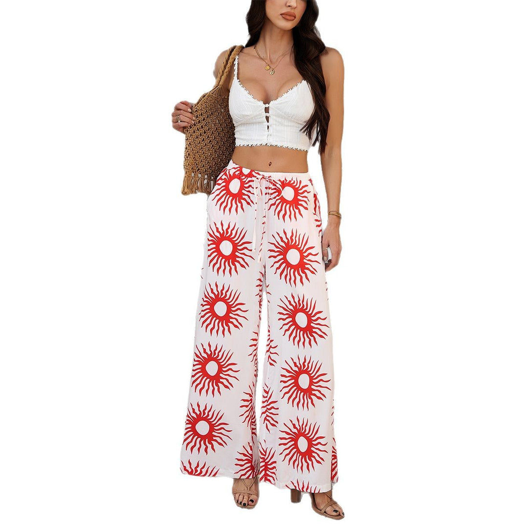 Women wide Palazzo pants with drawstring waistband, side pockets and Mediterranean tile print Mune Fashion