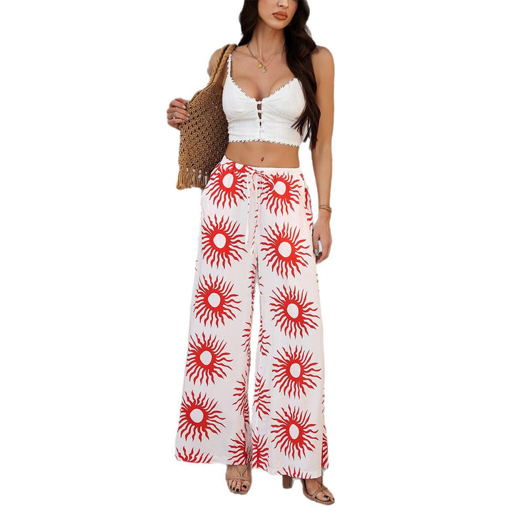 Women wide Palazzo pants with drawstring waistband, side pockets and Mediterranean tile print Mune Fashion