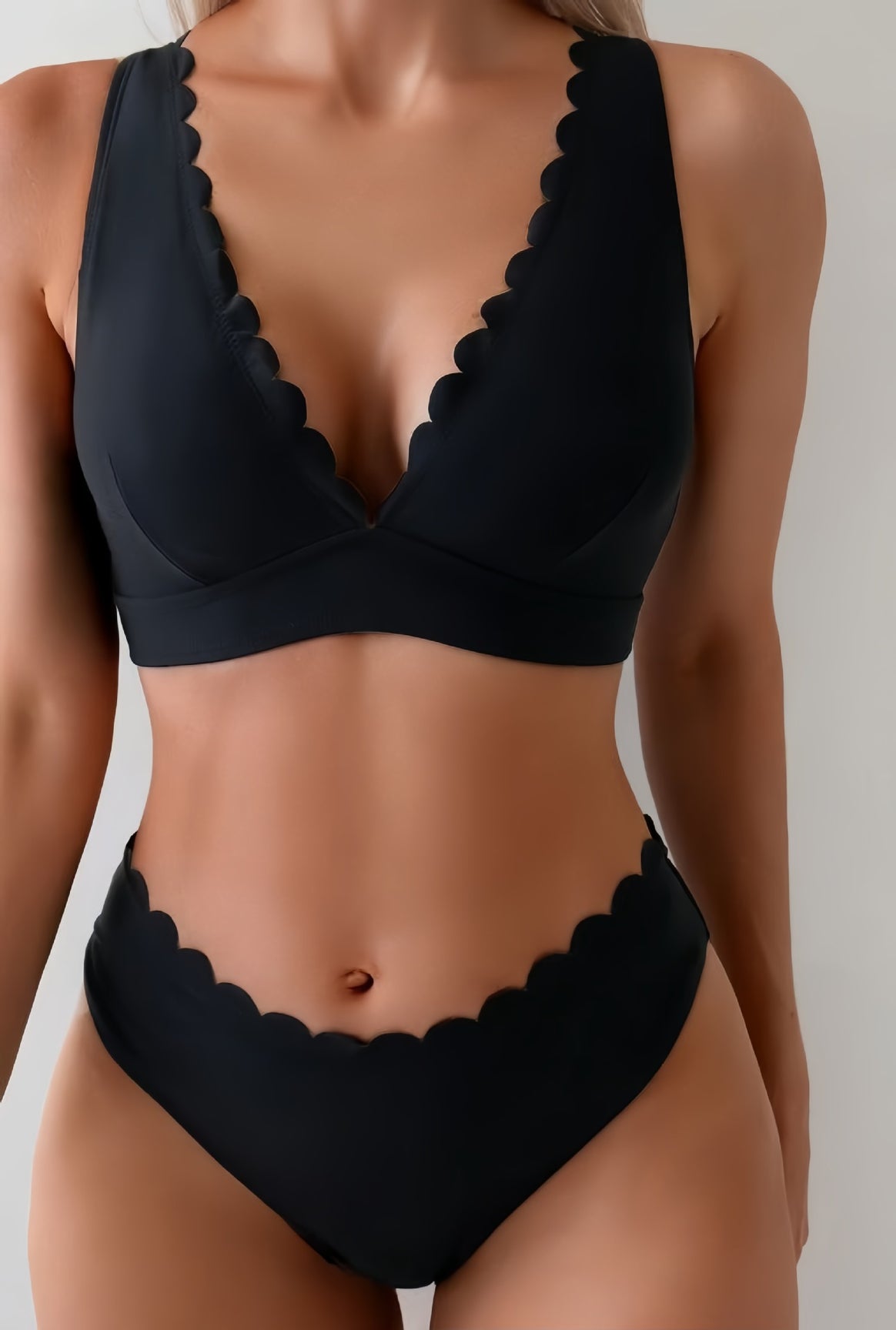 Women's bikini set with elegant wave edges and deep V-neck Mune Fashion