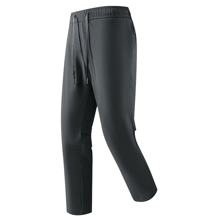 Men's sporty joggers with elastic waistband and side pockets Mune Fashion