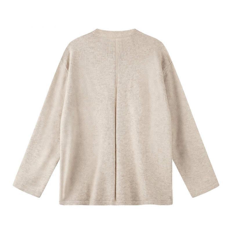 Unisex Oversize knit sweater with Henley button placket, straight hem and light texture Mune Fashion